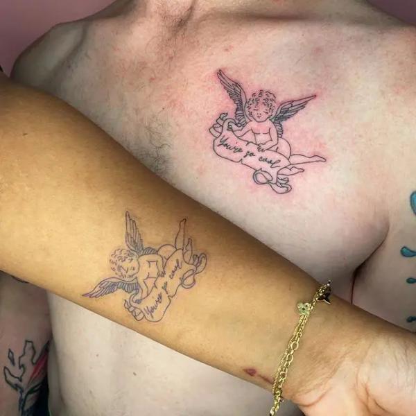 Cherub with banner bearing words Youve go cool