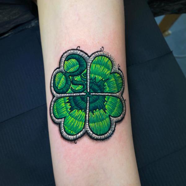 Clover patch tattoo