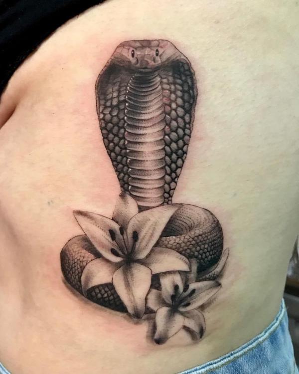 Cobra and lily tattoo
