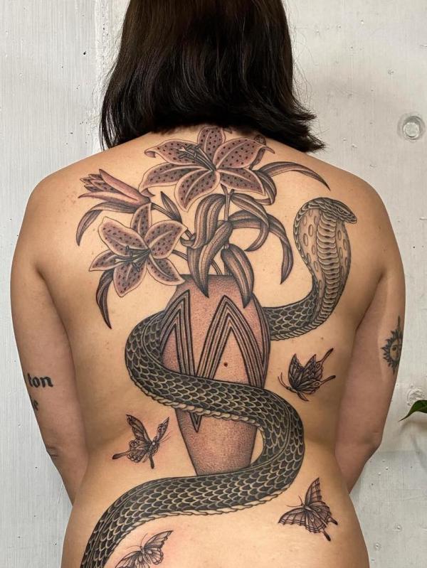 Cobra and tiger lily with butterfly back tattoo