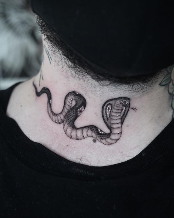 Cobra neck tattoo