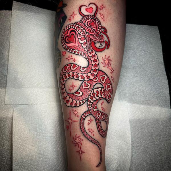 Cobra with heart and stars tattoo