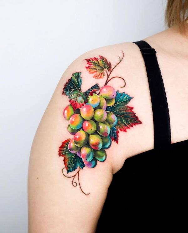 Colorful grape shoulder tattoo