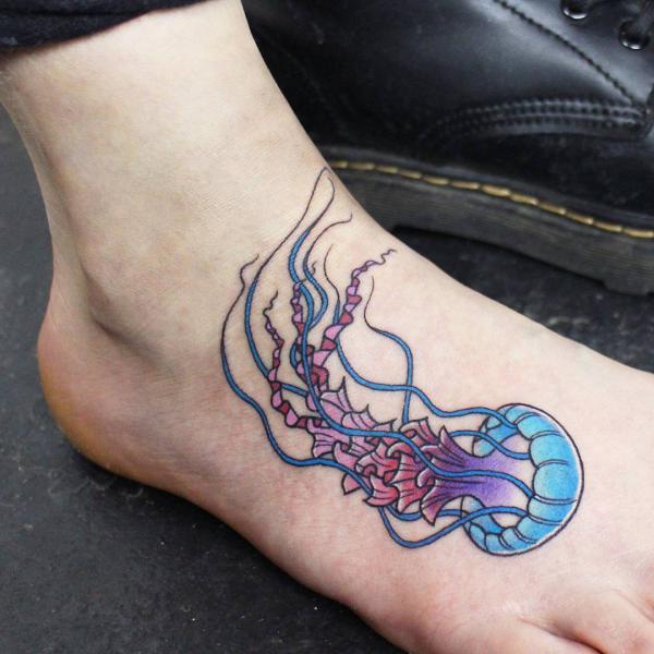 Colorful jellyfish foot tattoo
