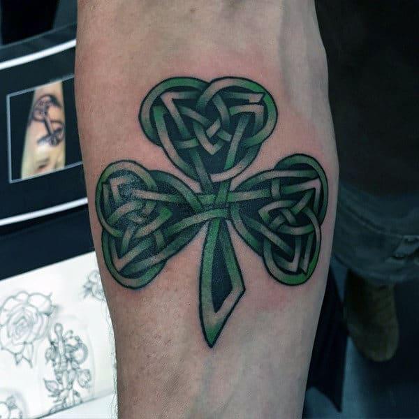 Cool trinity knot shamrock tattoo on arm