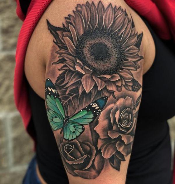 Dark sunflower and roses with blue butterfly tattoo