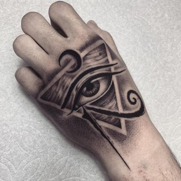 Eye of Horus and providence hand tattoo