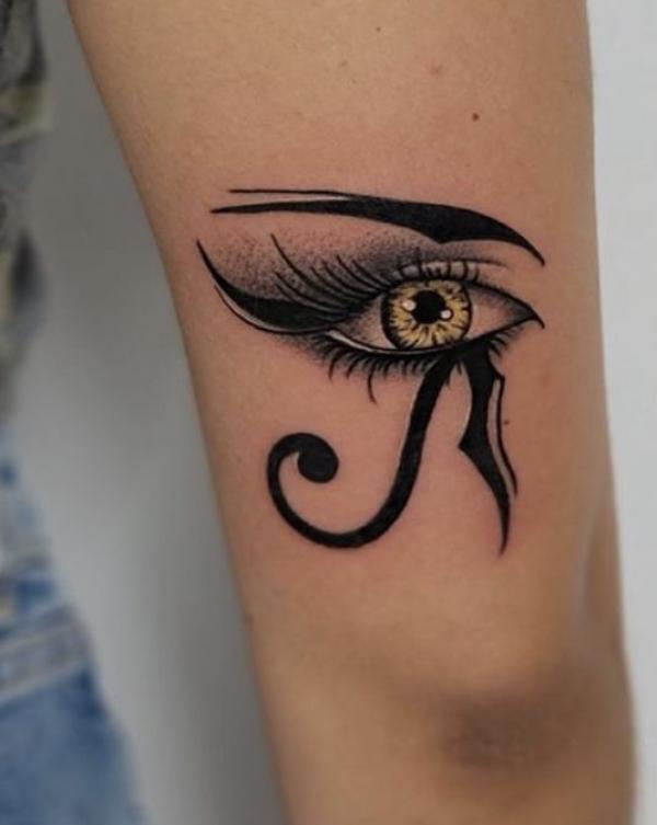 Eye of Ra above elbow tattoo