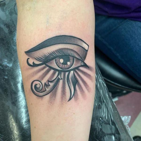 Eye of Ra with realistic eye and halo tattoo