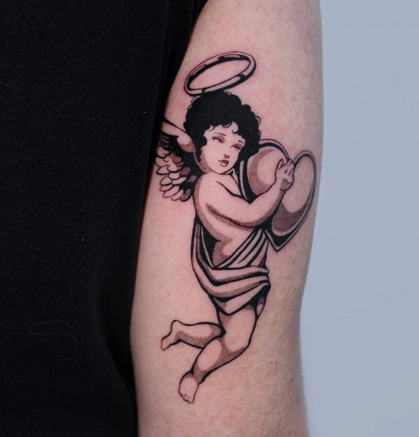 Falling cherub holding a love symbol