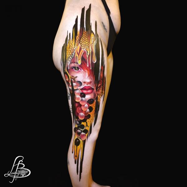 Female face and grape with melted corn tattoo