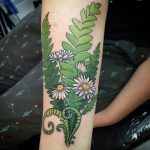 Fern and daisy tattoo