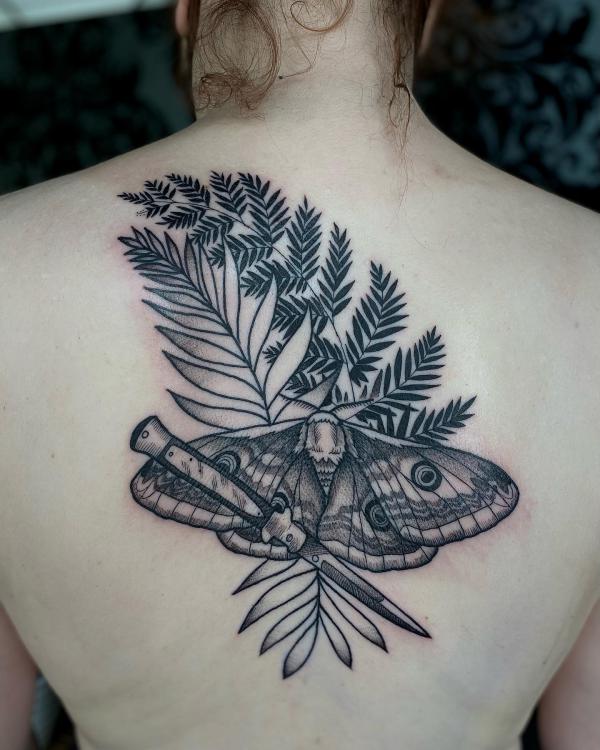 Fern and moth tattoo