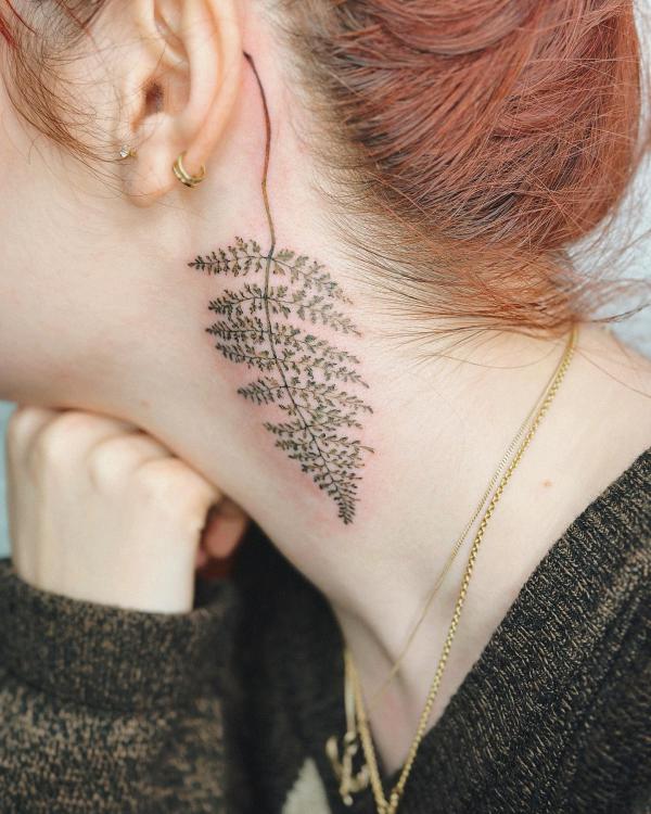Fern neck tattoo
