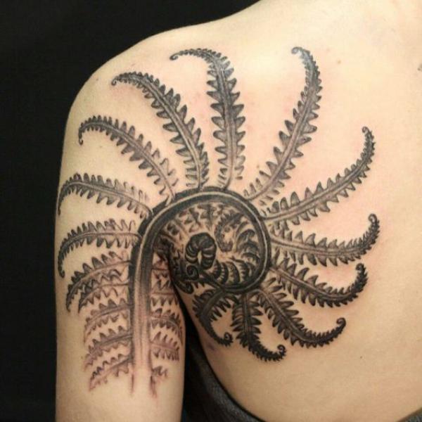 Fern spiral tattoo