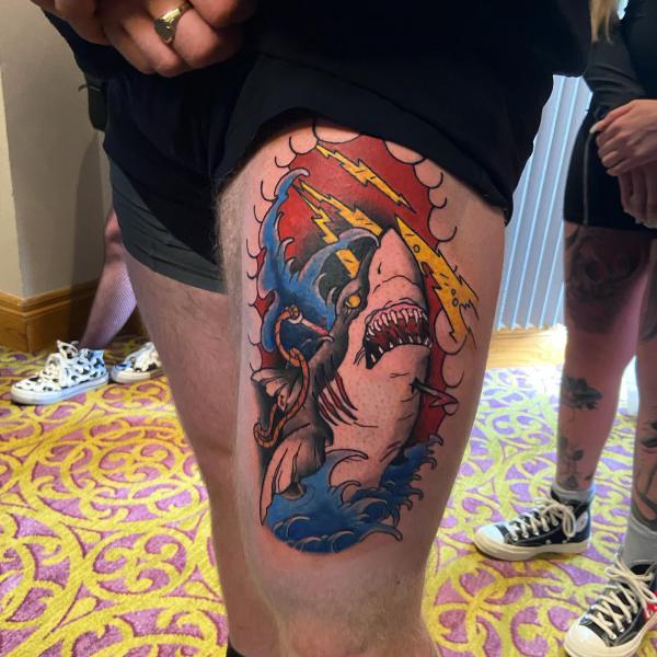 Fishing shark under lightning bolt tattoo traditional style