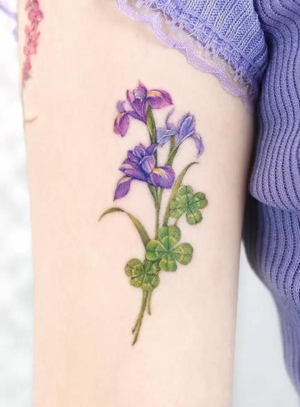 Four leaf Clover and Iris flower tattoo