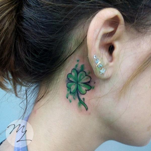 Four leaf clover tattoo behind ear