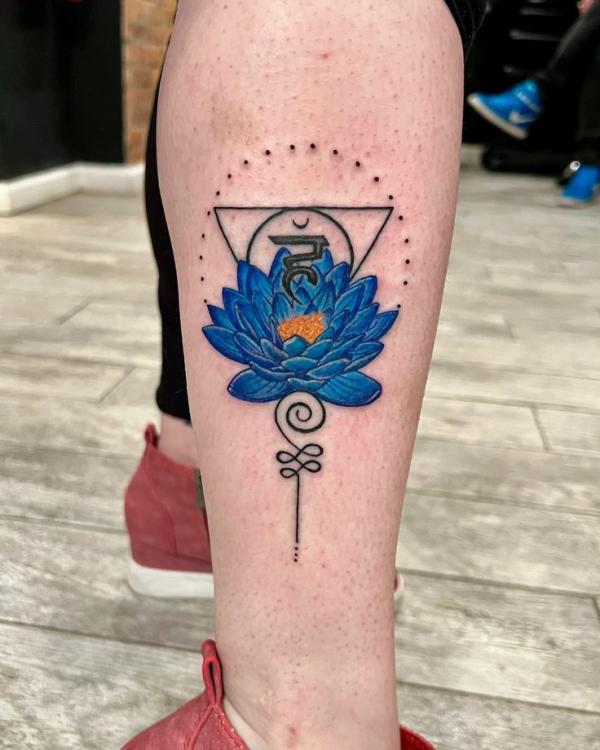 Geometric blue lotus with OM and the Unalome Symbol