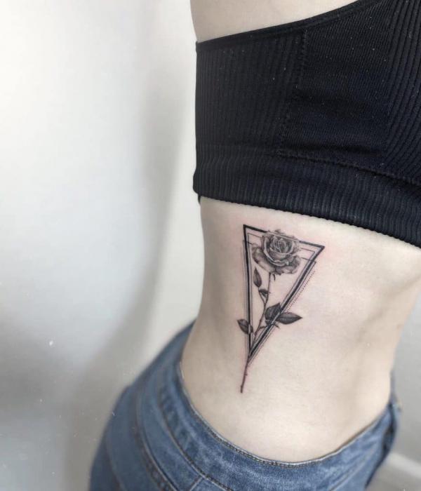Geometric rose with stem tattoo
