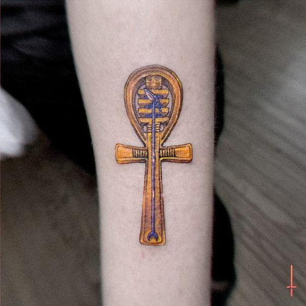 Gold Ankh tattoo