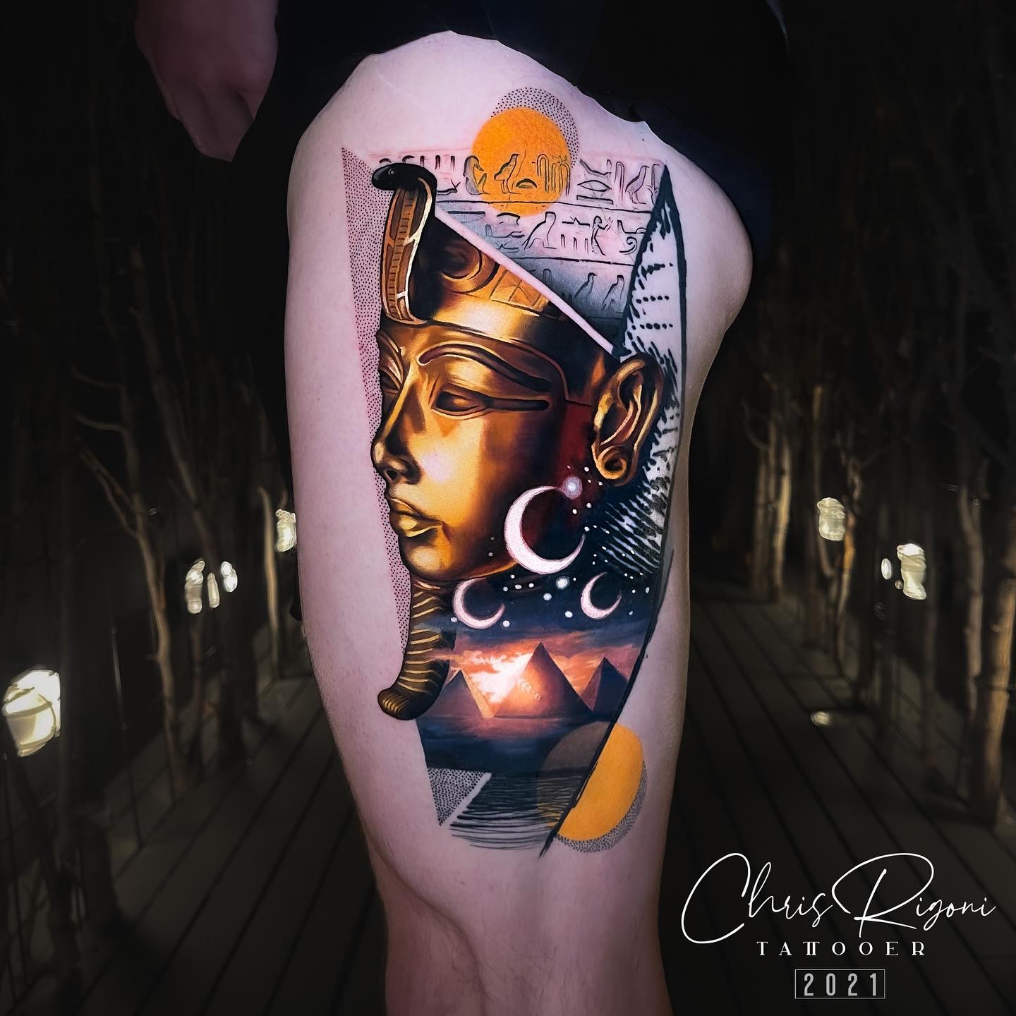 Golden King Tut portrait thigh tattoo