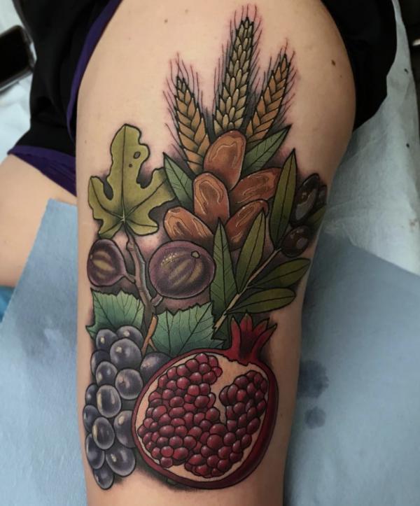 Grapes Pomegranate Oak Leave and wheat tattoo