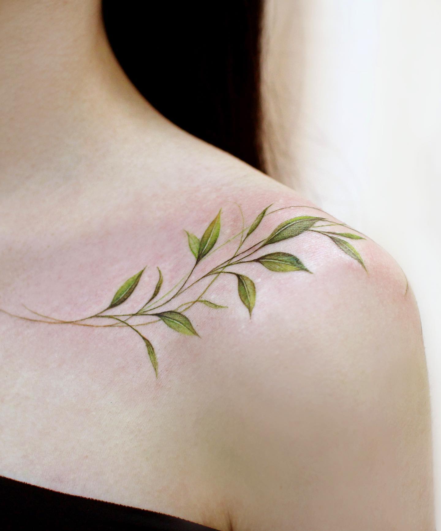 Green willow tree clavicle tattoo
