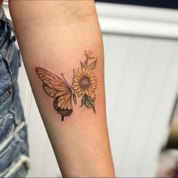 Half butterfly and half sunflower tattoo