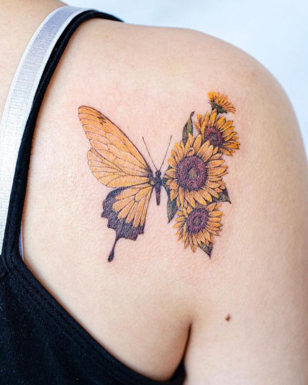 Half butterfly half sunflowers tattoo