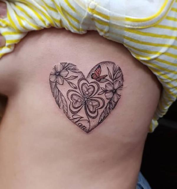 Heart tattoo with shamrock and butterfly