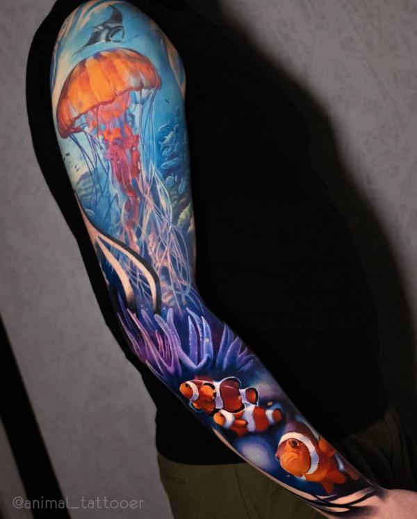 Jellyfish and clownfish full sleeve tattoo