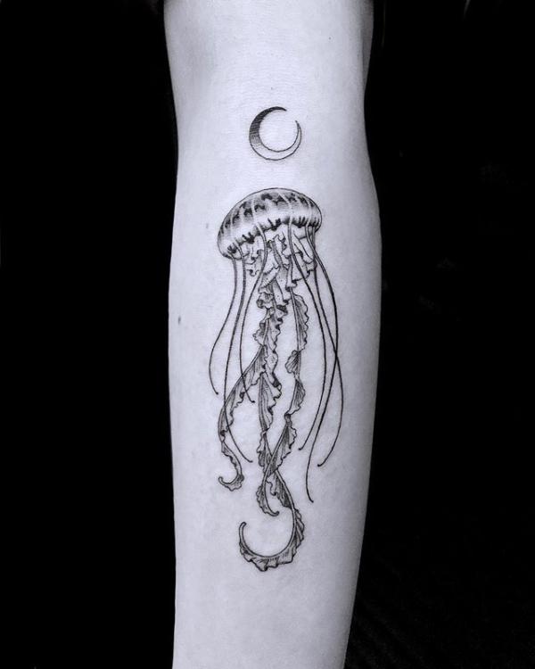 Jellyfish and crescent moon tattoo