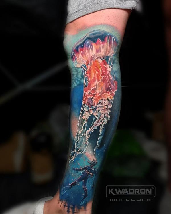 Jellyfish and scuba diver tattoo