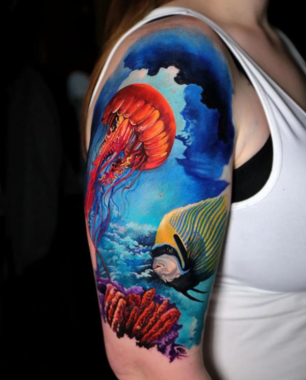 Jellyfish and sea fish tattoo