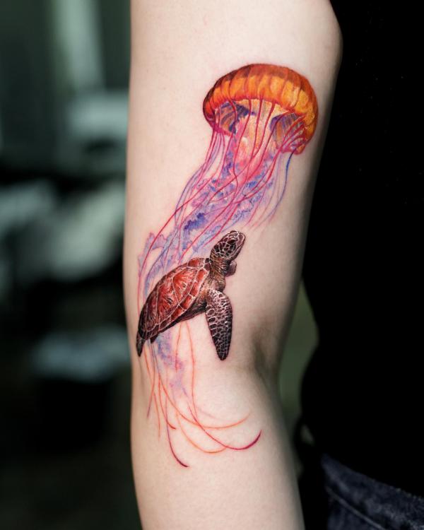 Jellyfish and turtle tattoo