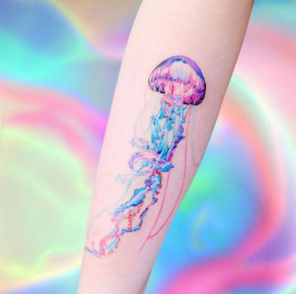 Jellyfish forearm tattoo