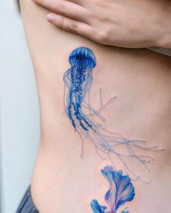 Jellyfish side tattoo