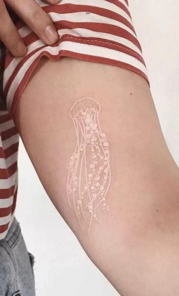 Jellyfish white ink tattoo