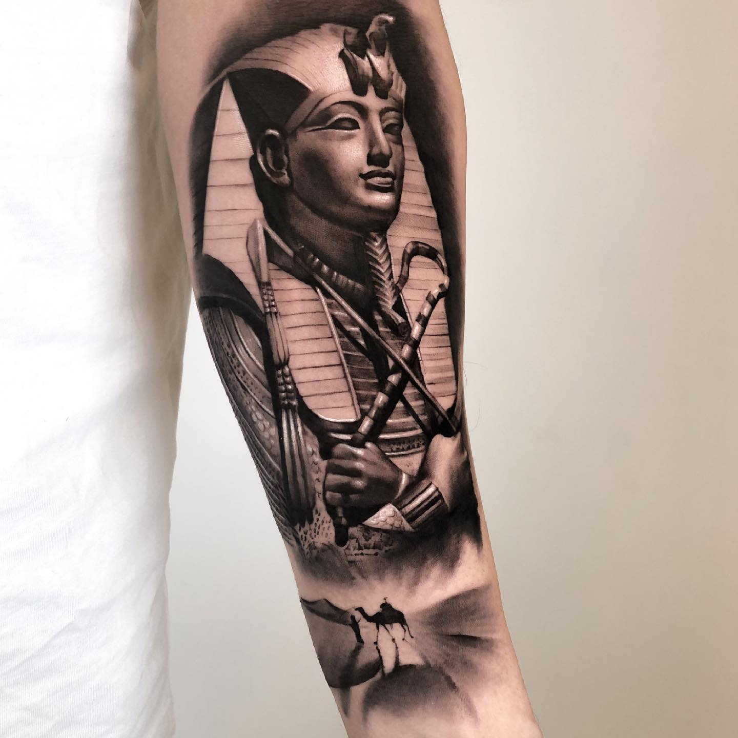 King Tut and desert forearm tattoo