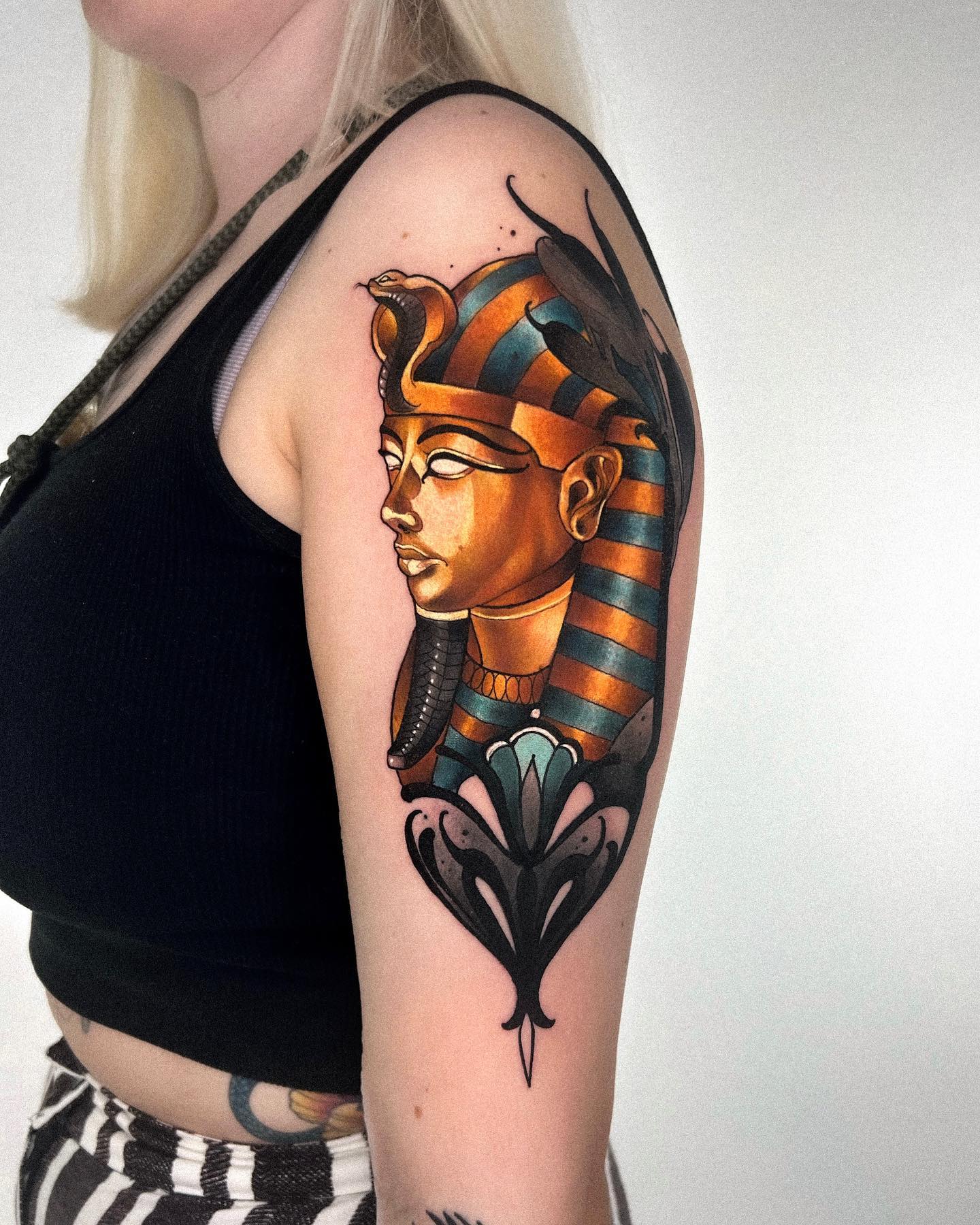 King Tut and stylized Egyptian Lotus tattoo