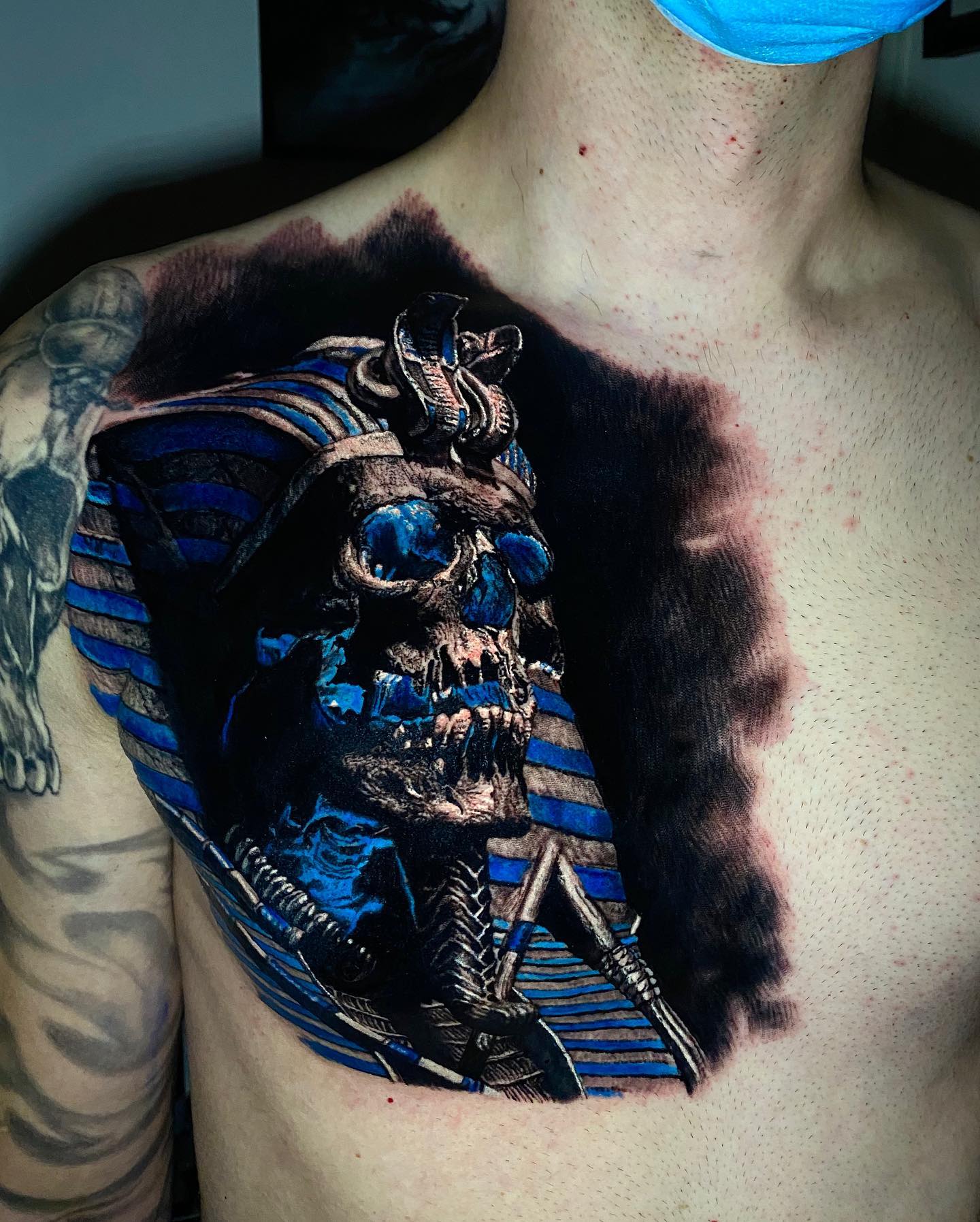 King Tut skull chest tattoo