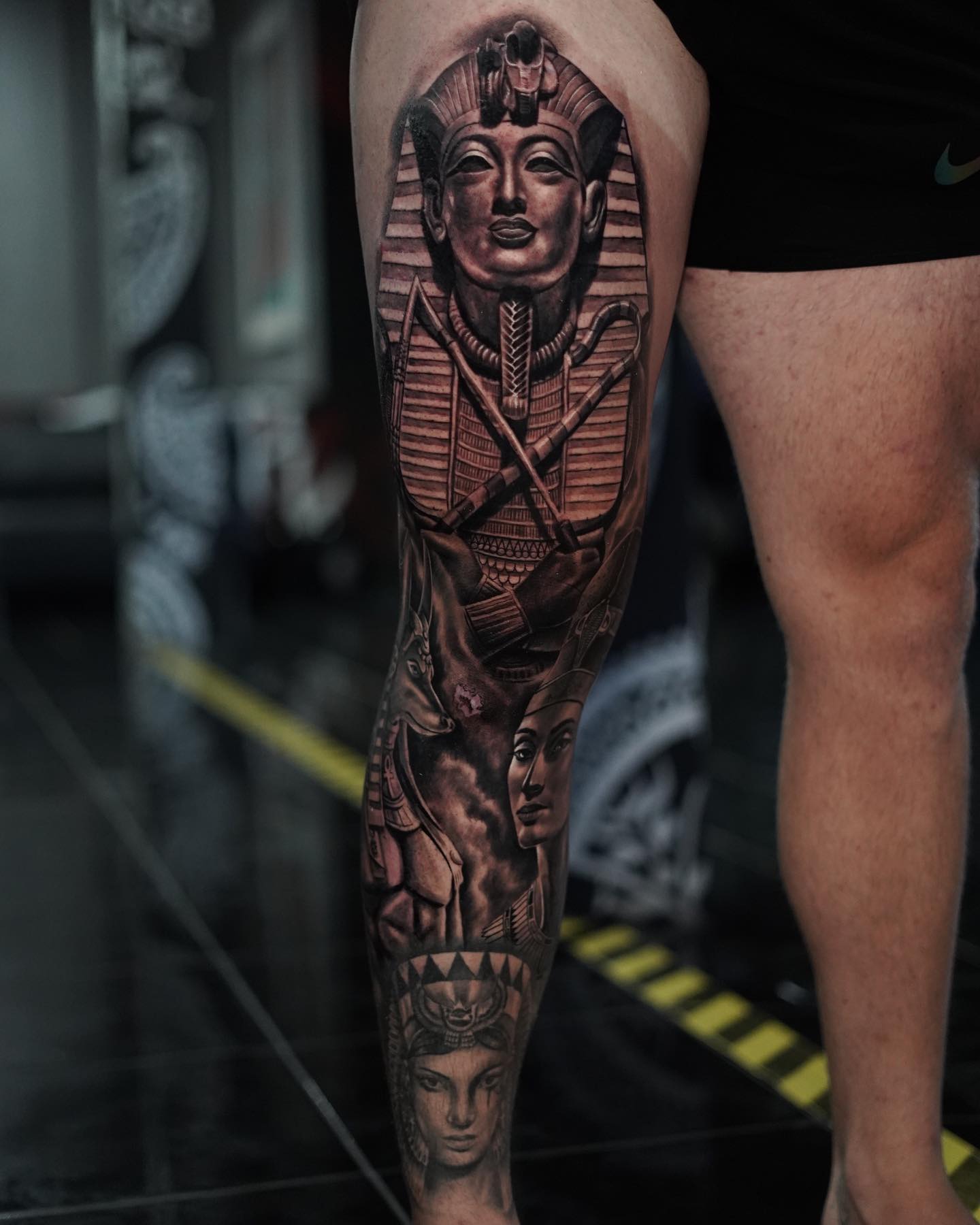 King Tut with Anubis and Nefertiti leg tattoo sleeve