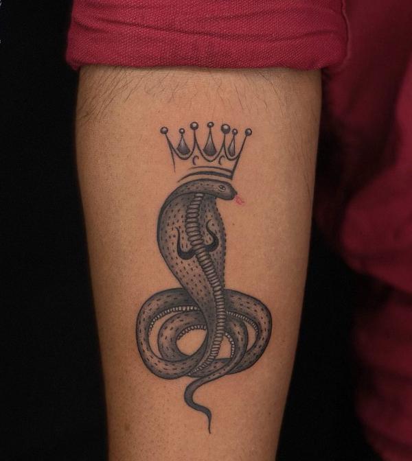 King cobra arm tattoo