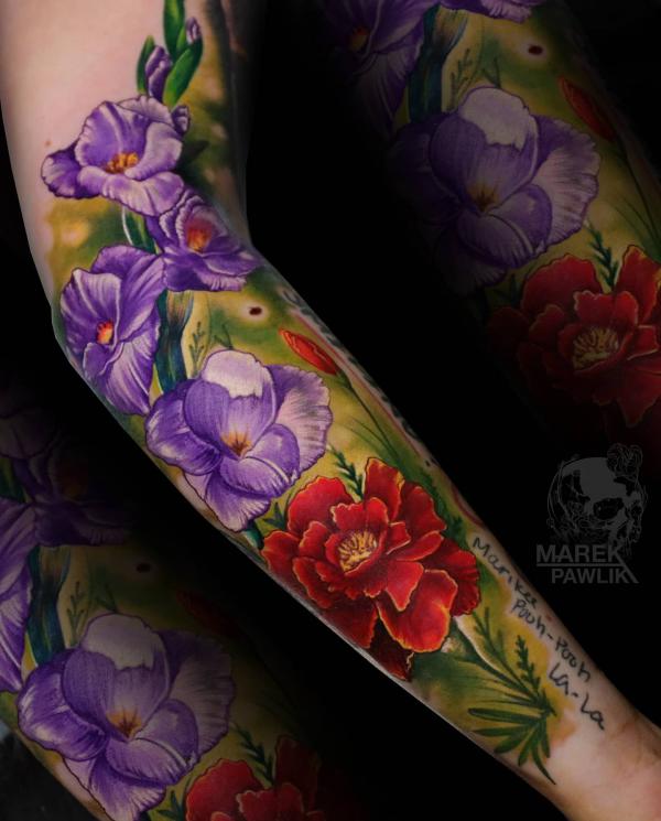 Marigold and morning glory tattoo sleeve