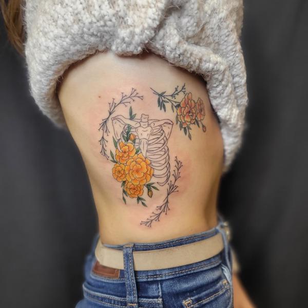 Marigold and skeleton tattoo