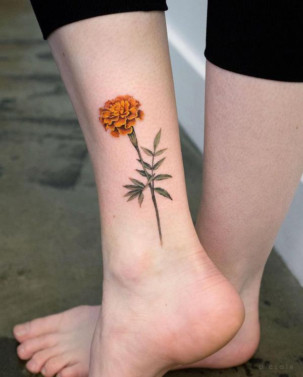 Marigold ankle tattoo