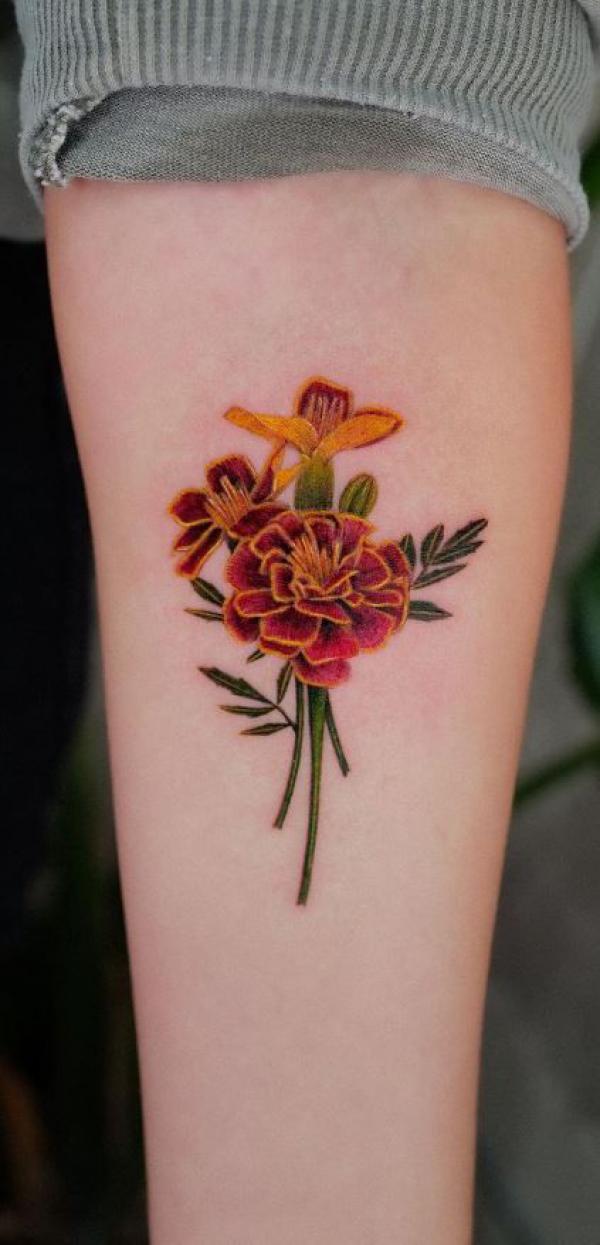 Marigold forearm tattoo