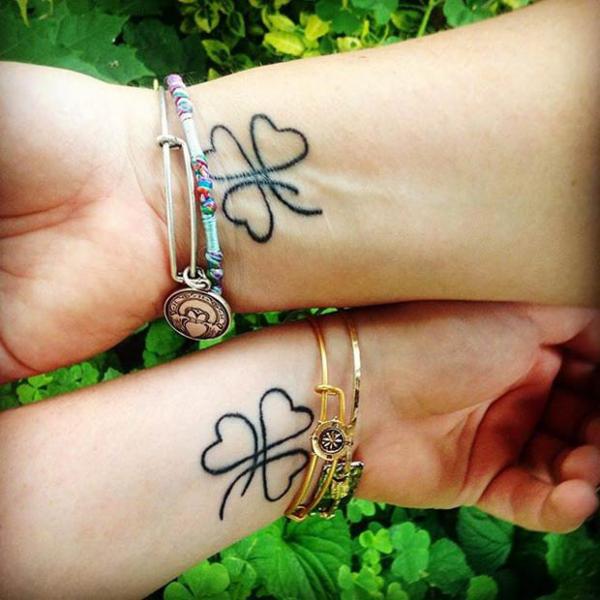 Mother and daughter clover tattoo