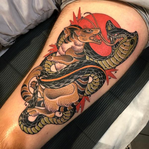 New school Mongoose and cobra tattoo